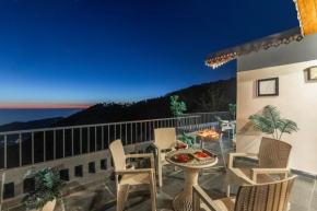 Alaya Stays Evara Serene 4 BHK Hill Retreat with Balcony, Fireplace & Scenic Views